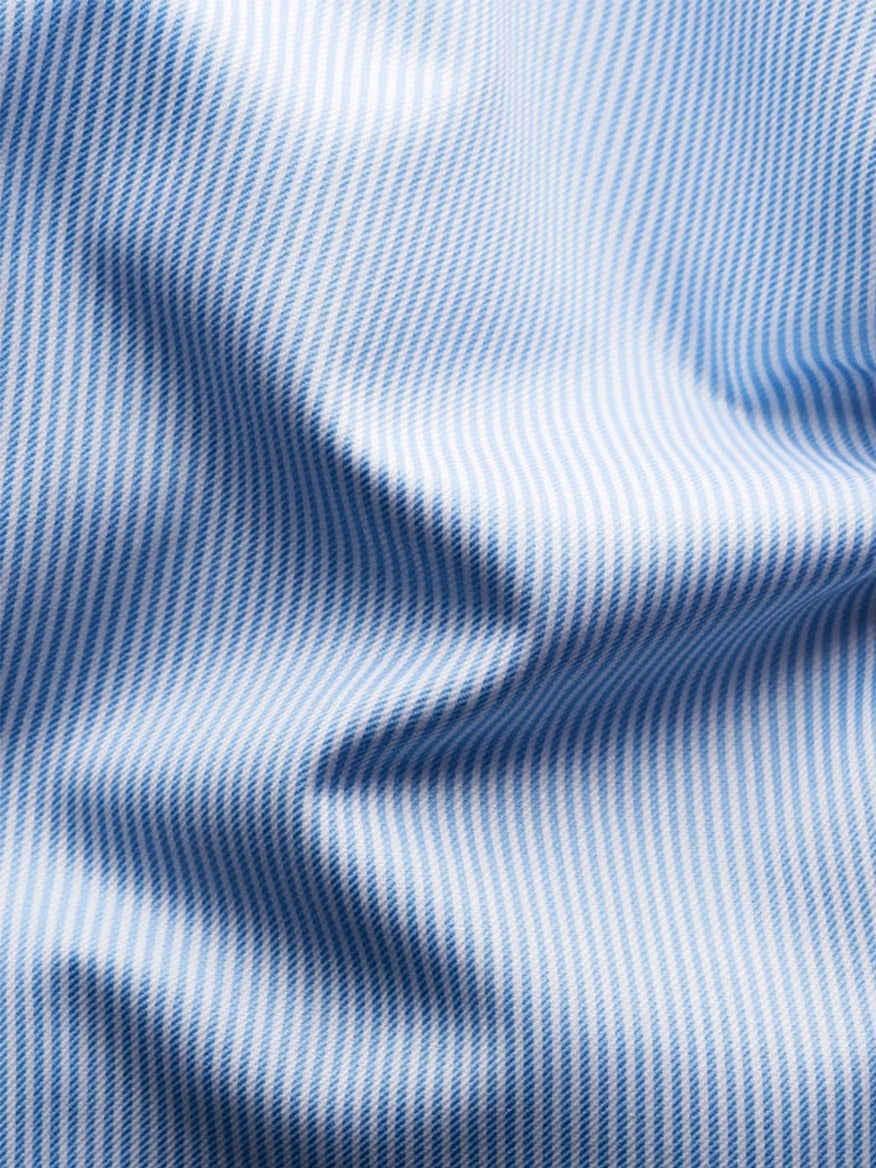 Close-up of the Eton Contemporary Fit Fine Striped Signature Twill Dress Shirt in Light Blue, showing its crisp pinstripes and textured folds—a true business classic.