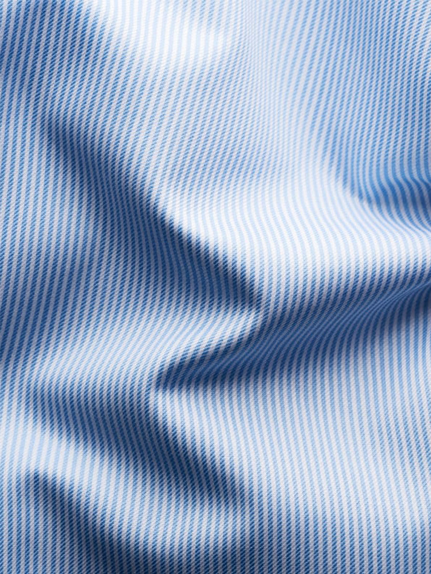 Close-up of Eton Slim Fit Fine Striped Signature Twill Dress Shirt in Light Blue, showcasing the cut away collar and crisp stripes—ideal for a business classic look.