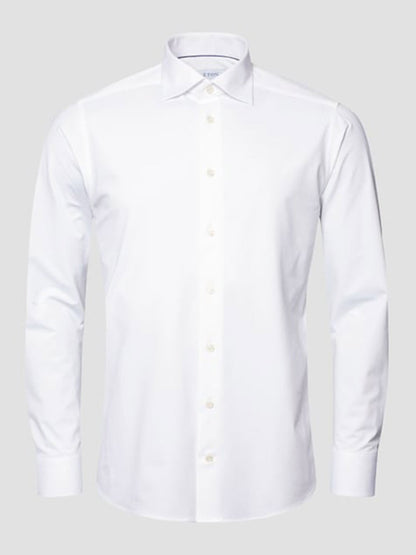The Eton Slim Fit White Four-Way Stretch Shirt is shown on a neutral background.