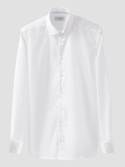 The Eton Contemporary Fit Solid Signature Twill Dress Shirt in White features a French cuff, crafted from signature twill organic cotton with a sharp collar and button-down front, displayed against a light gray background.