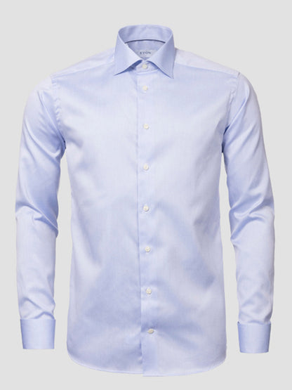 Light blue Eton Contemporary Fit Solid Signature Twill Dress Shirt with French cuffs, made from organic cotton and featuring a spread collar, shown on a plain gray background.