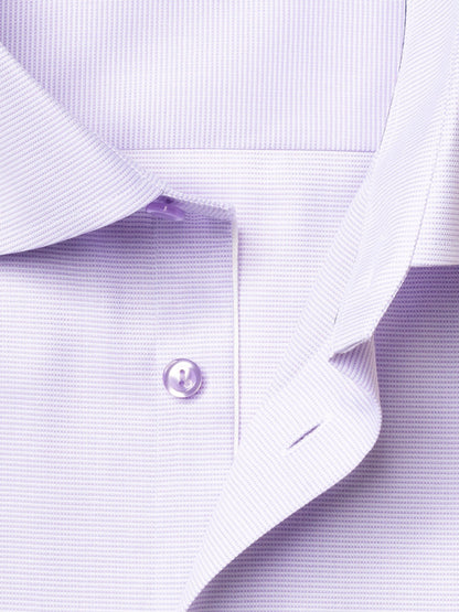 Close-up of the Eton Contemporary Fit Semi Solid Piping Details Dress Shirt in Light Purple, showcasing its cut away collar, button, and placket with fine textured fabric.