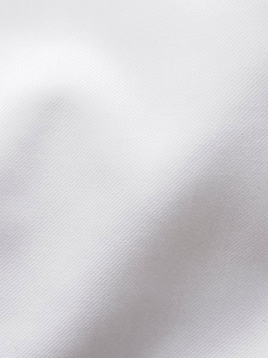 Close-up of the Eton Contemporary Fit White Signature Twill Dress Shirt shows its smooth, subtly textured fabric and gentle folds—ideal for a wrinkle-free, versatile look at any business meeting.