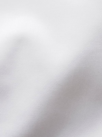 Close-up of the Eton Contemporary Fit White Signature Twill Dress Shirt shows its smooth, subtly textured fabric and gentle folds—ideal for a wrinkle-free, versatile look at any business meeting.