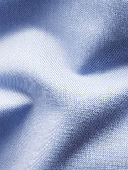 Close-up of the Eton Contemporary Fit Light Blue Signature Twill Dress Shirt, showcasing its fine twill weave texture and soft, subtle folds.