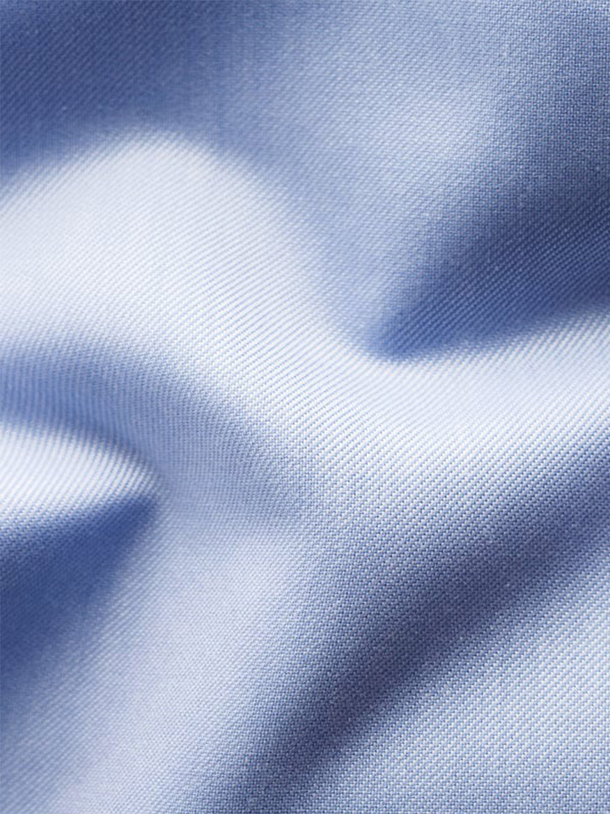 Close-up of Eton Slim Fit Solid Signature Twill Dress Shirt in Light Blue, showcasing the textured organic cotton fabric and gentle folds.