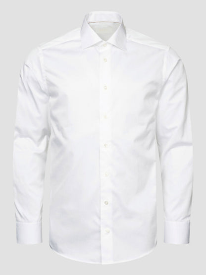 The Eton Contemporary Fit Solid Elevated Twill Dress Shirt in White features a classic collar and long sleeves, showcased against a neutral grey background.