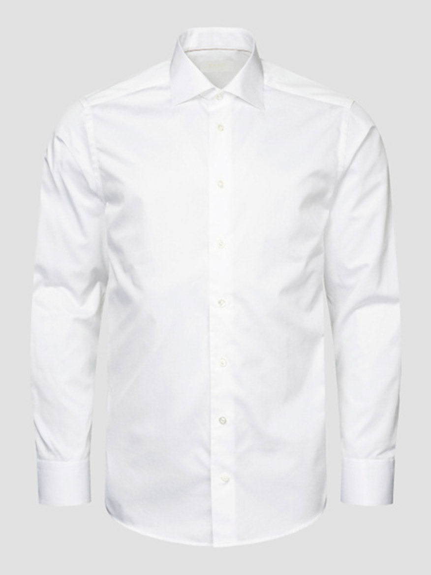 The Eton Slim Fit Solid Elevated Twill Dress Shirt in White is crafted from organic Supima cotton with a spread collar and crease-resistant finish, shown against a light gray background.