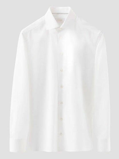 The Eton Slim Fit Solid Elevated Twill Dress Shirt in White, featuring a collar and long sleeves, is crafted from organic Supima cotton and displayed on a neutral gray background.