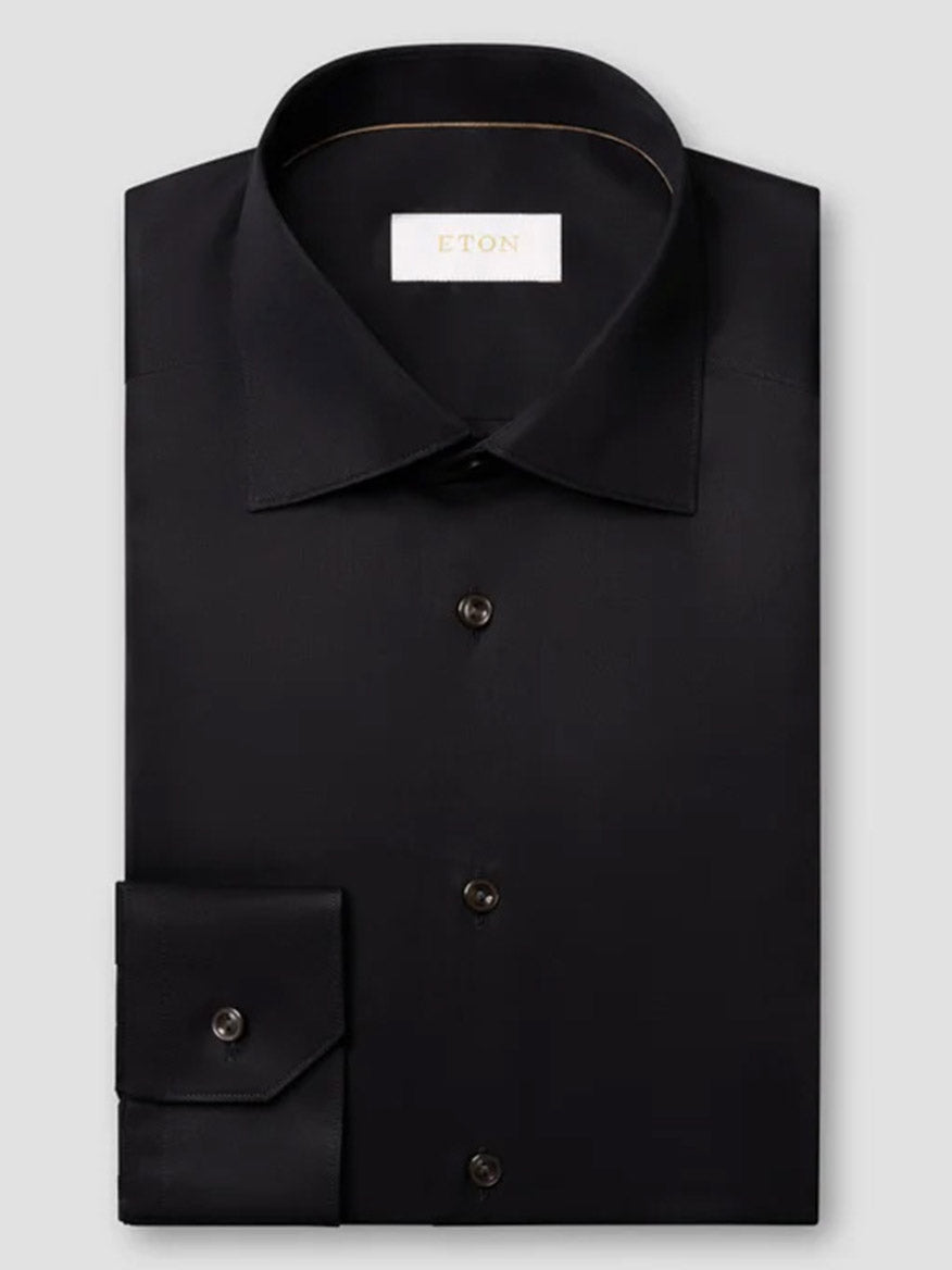 Eton Slim Fit Solid Elevated Twill Dress Shirt in black, featuring long sleeves, a spread collar, a wrinkle-resistant finish, and buttoned cuffs.