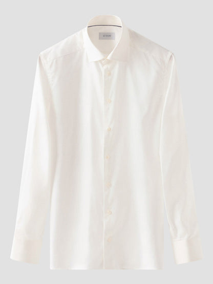 An Eton Contemporary Fit Solid Signature Twill Dress Shirt in Off-White is displayed against a light gray background.