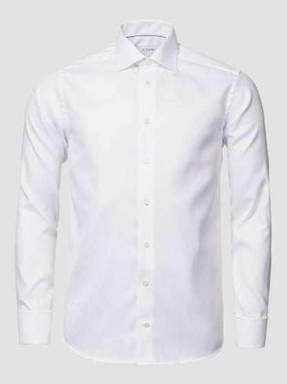 The Eton Contemporary Fit Solid Textured Twill Dress Shirt in White with French cuffs is displayed against a light gray background.