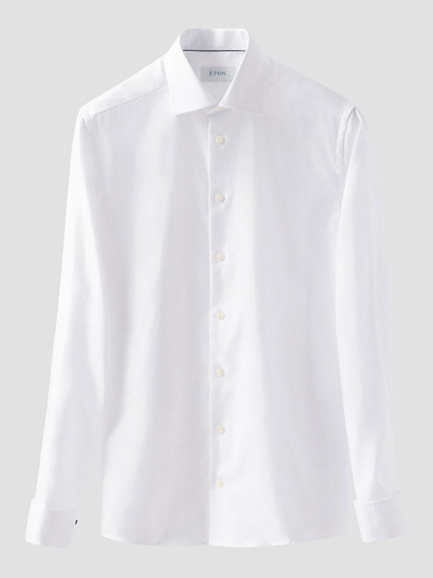 The Eton Contemporary Fit Solid Textured Twill Dress Shirt in White with French cuffs is shown against a light gray background.