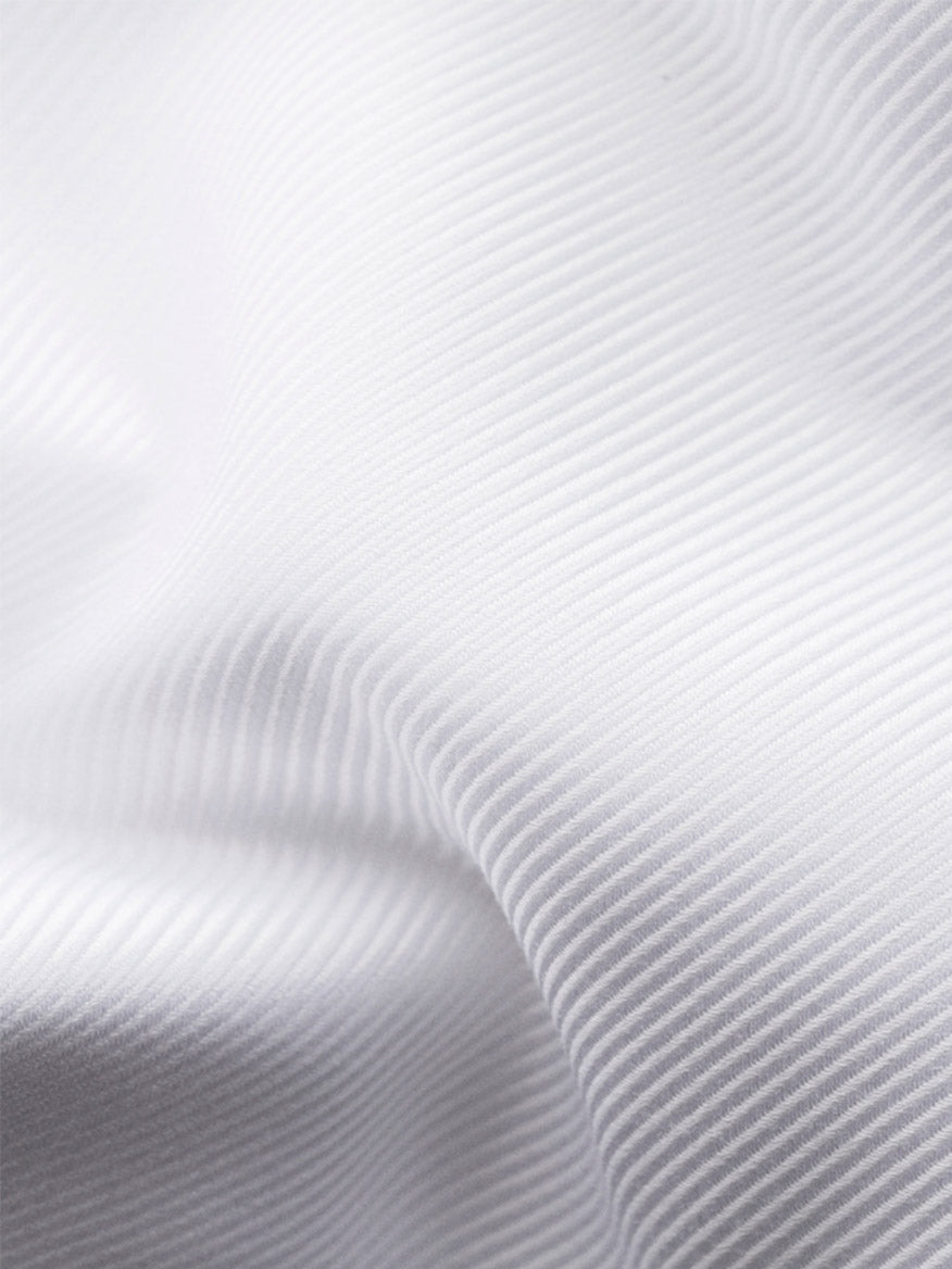 Close-up of the Eton Contemporary Fit Solid Textured Twill Dress Shirt in White, highlighting its fine, evenly spaced horizontal ridges and gentle folds.
