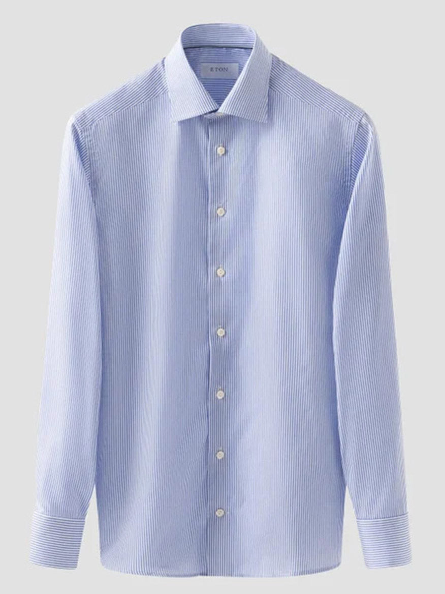 Eton Contemporary Fit Striped Fine Twill Dress Shirt in Light Blue, featuring long sleeves, thin white vertical stripes, white buttons, and a classic collar, shown on a plain light gray background.