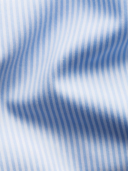 Close-up of the Eton Slim Fit Striped Fine Twill Dress Shirt in Light Blue with a cut away collar, featuring light blue and white bengal stripes and subtle folds—ideal for a sharp, modern look.