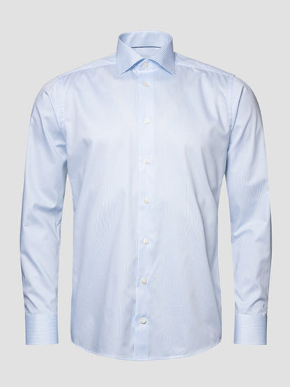 Eton Slim Fit Striped Fine Twill Dress Shirt in Light Blue, featuring a cut away collar, displayed on a plain grey background.