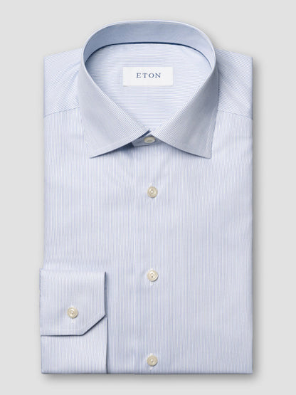 The Eton Contemporary Fit Striped Twill Dress Shirt in Dark Blue, displayed on a light gray background with white buttons and the "ETON" label inside the collar, is a sophisticated business essential crafted from fine cotton.