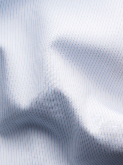 Close-up of the Eton Slim Fit Striped Twill Dress Shirt in Light Blue, featuring thin vertical stripes and a crease-resistant cotton twill—ideal for a sharp, polished look.