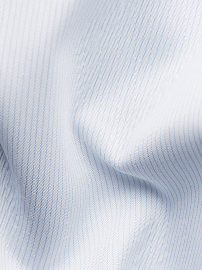 Close-up of Eton Slim Fit Striped Twill Dress Shirt in Light Blue, featuring white cotton twill with thin light blue vertical pinstripes and visible folds—perfect for a crease-resistant dress shirt.