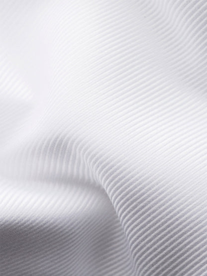 Close-up of the Eton Slim Fit Solid Textured Twill Dress Shirt in White, featuring subtle ribbed texture and gentle folds—ideal for refined business attire.