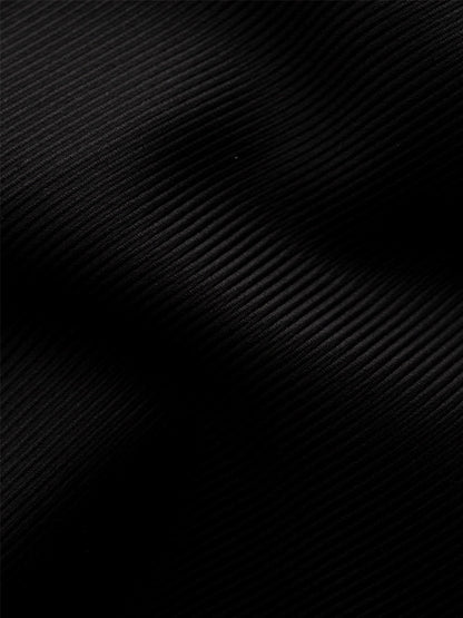 Close-up of the Eton Slim Fit Black Textured Twill Dress Shirt, showing its fine vertical ribbed texture and subtle sheen—perfect for refined business attire.
