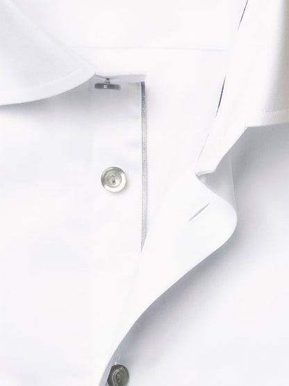 Close-up of the Eton Slim Fit Signature Twill Dress Shirt in white with grey details, showcasing the buttons, buttonholes, and part of the collar.