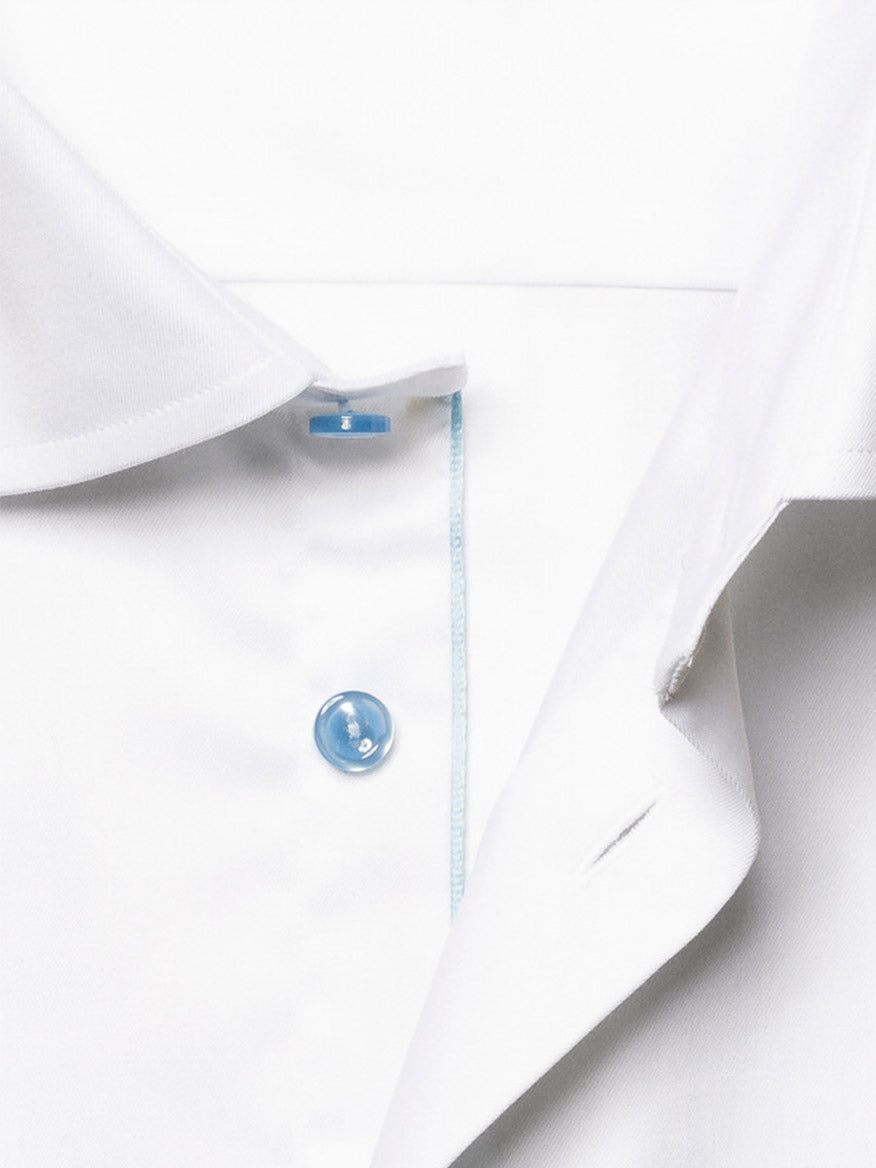 Close-up of the Eton Contemporary Fit White Twill Dress Shirt, showcasing a crisp white collar, blue buttons, and a subtle light blue stitch along the placket.