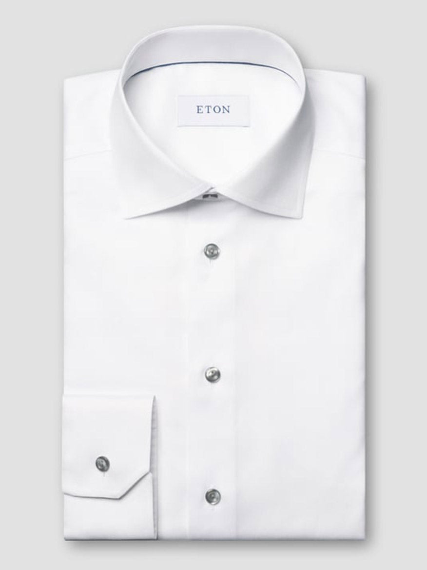 The Eton Contemporary Fit White Twill Dress Shirt features grey details, a classic collar, buttoned cuffs, and the signature ETON label inside the collar for a refined look.