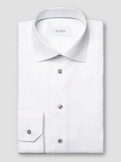 The Eton Contemporary Fit White Twill Dress Shirt features grey details, a classic collar, buttoned cuffs, and the signature ETON label inside the collar for a refined look.
