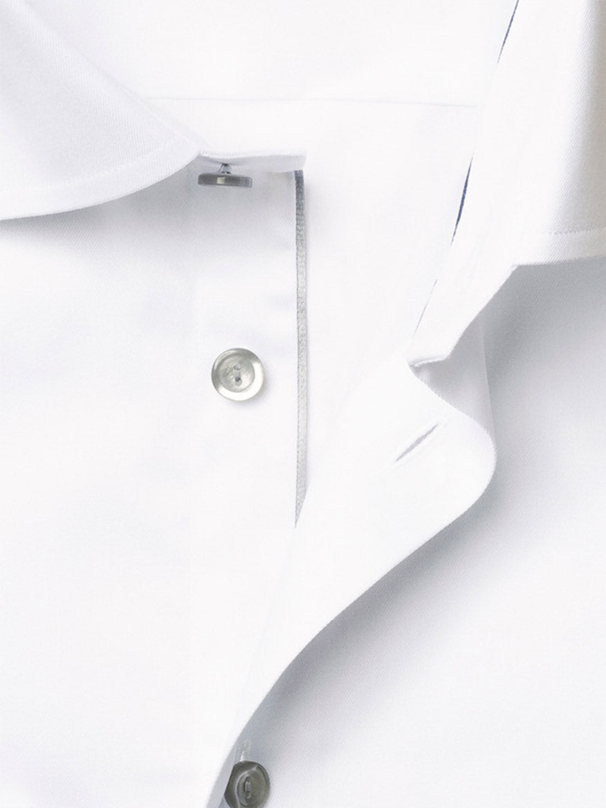 Close-up of the Eton Contemporary Fit White Twill Dress Shirt with Grey Details, featuring its signature twill fabric, buttons, buttonholes, and part of the collar.