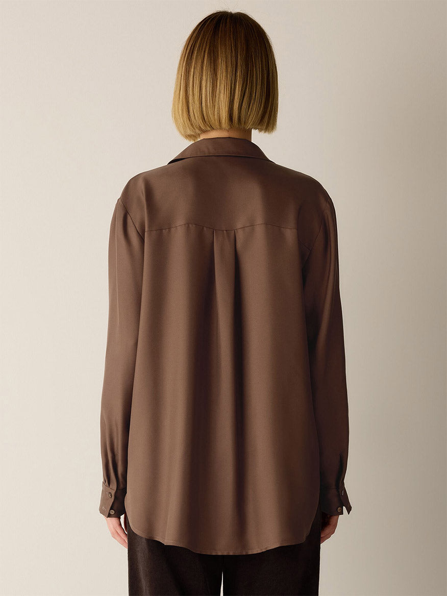 Back view of an Eileen Fisher Silk Twill Classic Collar Shirt in Hazelwood, featuring a box pleat at the center back yoke.