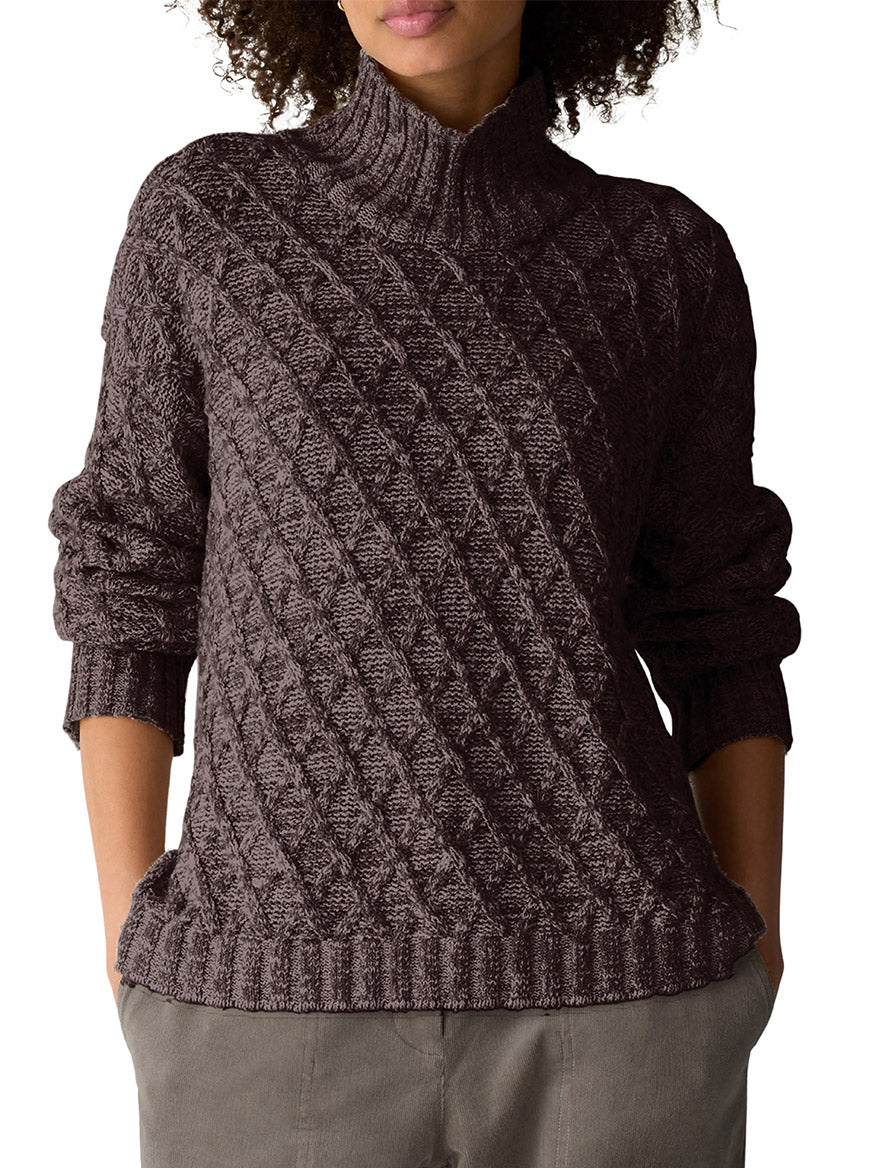Eileen Fisher Peruvian Cotton Boucle Fluff Turtleneck in Coffee, a dark brown turtleneck sweater with a textured, diagonal knit pattern made from organic cotton.