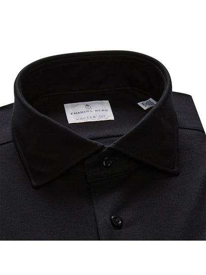 The Emanuel Berg Modern 4Flex Stretch Knit Dress Shirt in Black features a collar and buttons, with the inner tag showcasing an "Emanuel Berg Modern Fit" label. This wrinkle-resistant piece seamlessly blends style and functionality for comfortable all-day wear.