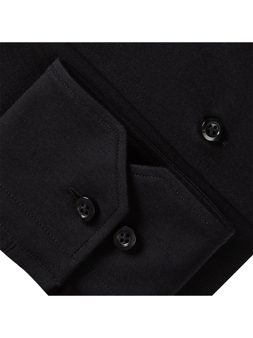 A close-up of the black Emanuel Berg Modern 4Flex Stretch Knit Dress Shirt features buttoned flaps and a pocket with sleek black buttons.