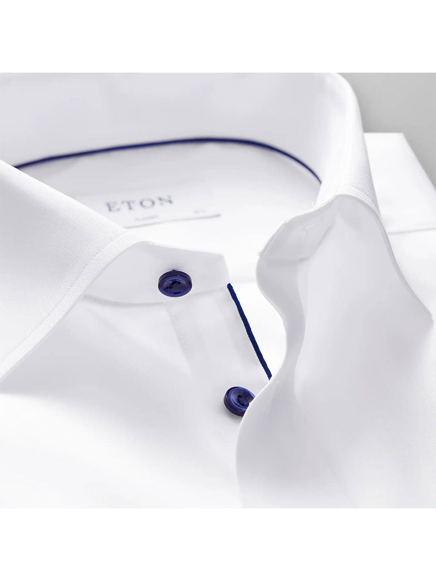 A close up of a Eton Classic Fit White Twill Dress Shirt with Navy Details.