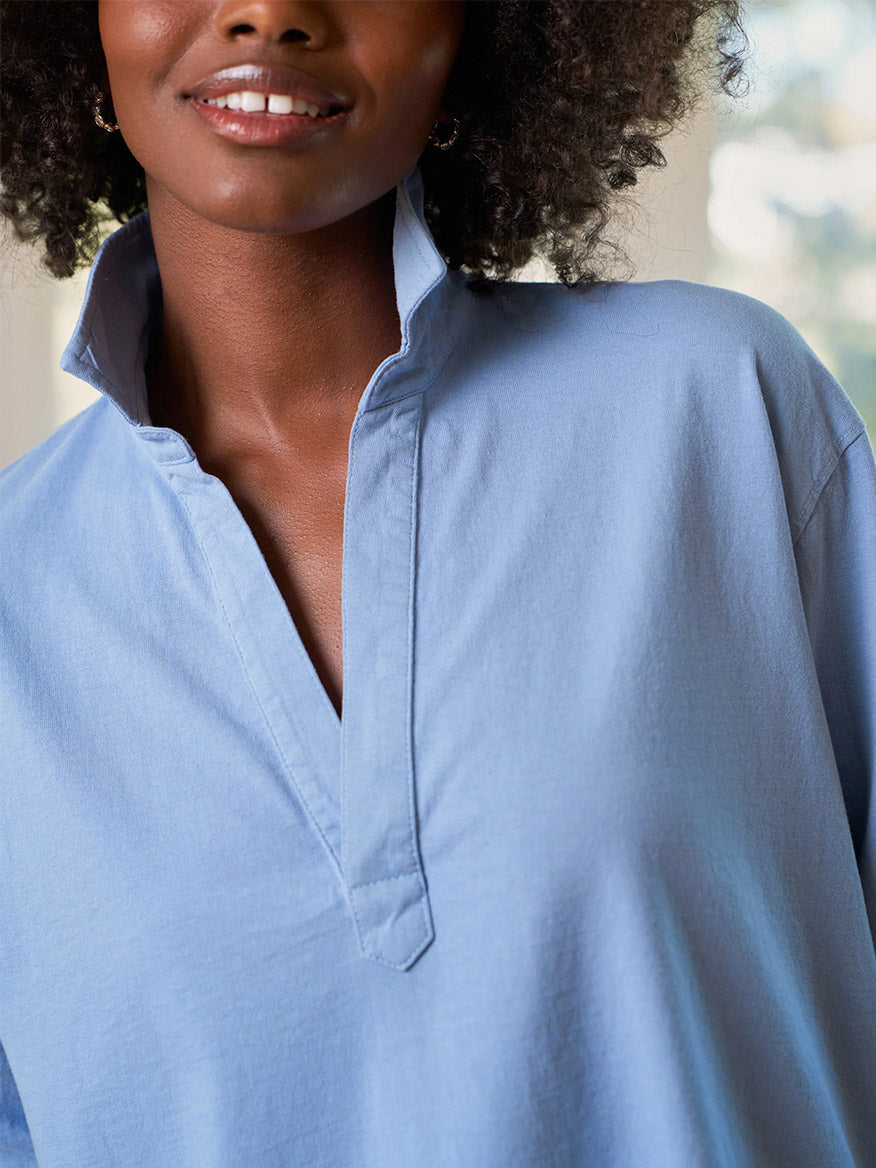 A person wearing the Frank & Eileen Patrick Popover Henley in Fog Vintage Jersey with the collar popped up, shown from the shoulders up.