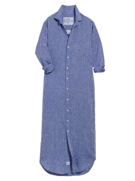 The Frank & Eileen Rory Maxi Shirtdress in Classic Blue Wash is a long-sleeved, collared button-up dress with a single chest pocket, styled flat with sleeves slightly rolled for relaxed California chic.