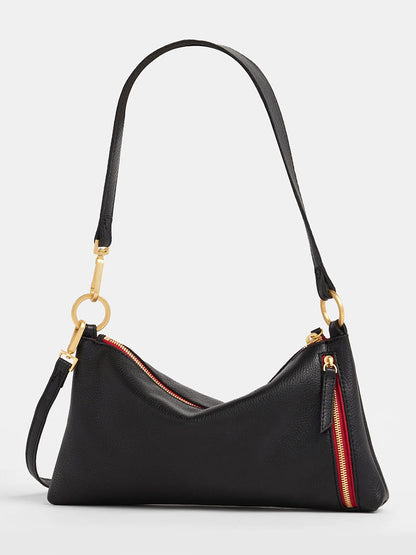 The Hammitt Los Angeles Kyle Shoulder Bag in Black with Brushed Gold accents and a Red Zip is crafted from black pebbled leather, offering a curved silhouette. It includes an adjustable crossbody strap for added convenience.