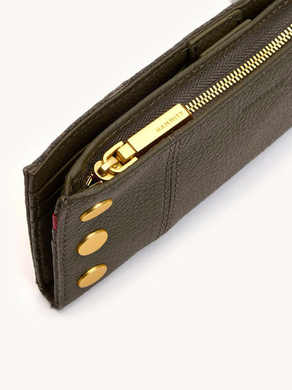 A close-up of the Hammitt Los Angeles 110 North Wallet in Olive/Brushed Gold, showing its textured green leather, gold snap buttons, multiple card slots, and a brushed gold zipper pull.