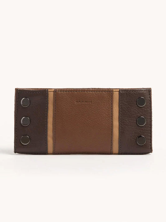 The Hammitt Los Angeles 110 North Wallet in Orchestra Brown is a folding wallet made from pebbled leather, showcasing two-tone brown panels and decorated with six metal button embellishments.