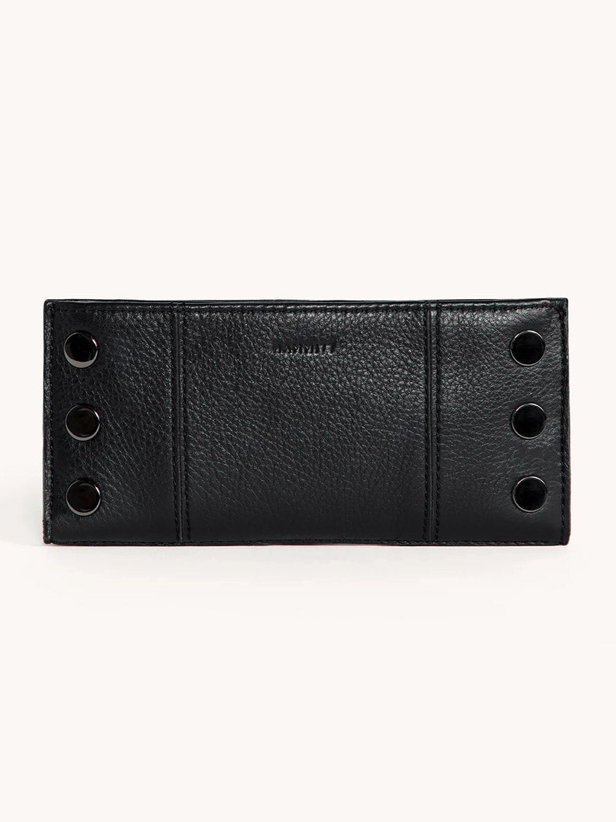 The Hammitt Los Angeles 110 North Wallet in Black/Gunmetal is a black pebble leather folding wallet with a textured finish, four metal snap buttons on each side, and multiple credit card slots for convenience.