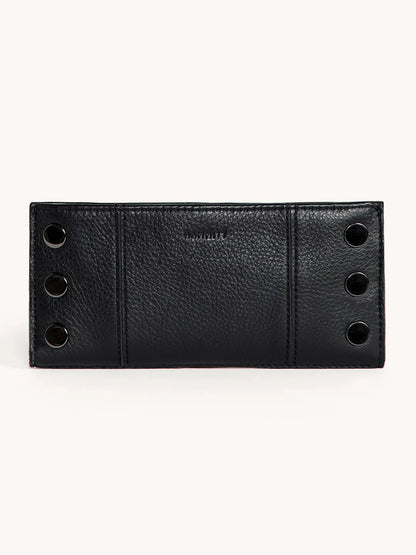 The Hammitt Los Angeles 110 North Wallet in Black/Gunmetal is a black pebble leather folding wallet with a textured finish, four metal snap buttons on each side, and multiple credit card slots for convenience.