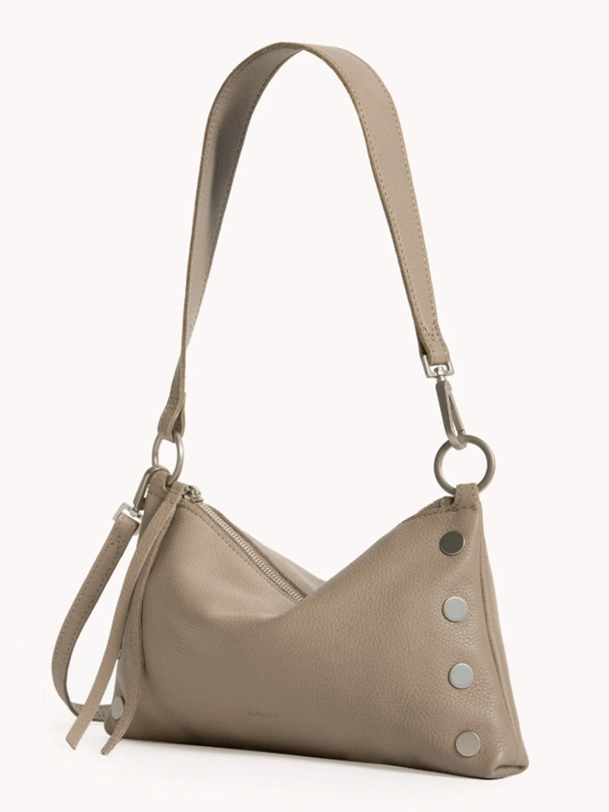 Hammitt Los Angeles Kyle Shoulder Bag in Pewter Pebble/Brushed Silver features a wide strap, silver-tone hardware, side zipper, and three round metal studs—versatile for use as a crossbody or wristlet.