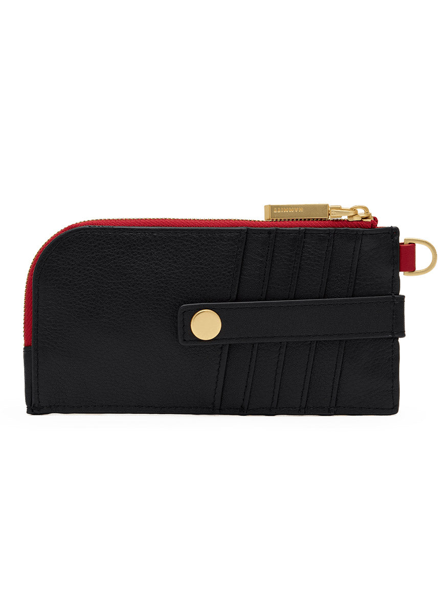 The Hammitt Los Angeles 210 East Wallet in Black/Brushed Gold/Red Zip features black pebbled leather, a gold snap button closure, multiple card slots, a red zipper with a gold zipper pull, and a slim design with a D-ring. Inspired by the iconic Hammitt 210 East style, it is displayed against a plain white background.