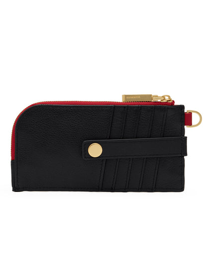 The Hammitt Los Angeles 210 East Wallet in Black/Brushed Gold/Red Zip features black pebbled leather, a gold snap button closure, multiple card slots, a red zipper with a gold zipper pull, and a slim design with a D-ring. Inspired by the iconic Hammitt 210 East style, it is displayed against a plain white background.
