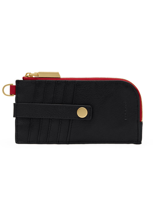 The Hammitt Los Angeles 210 East Wallet in Black/Brushed Gold/Red Zip features black pebbled leather, gold hardware, a snap strap, multiple card slots, and a red-lined zipper edge—a slim wallet with D-ring that embodies the signature style of the Hammitt 210 East collection.