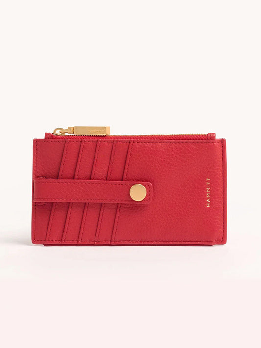 The Hammitt Los Angeles 210 West Wallet in poppy red features luxurious pebbled leather with a gold zipper and button. It includes multiple card slots and a chic strap detail, ideal for keeping essentials organized.