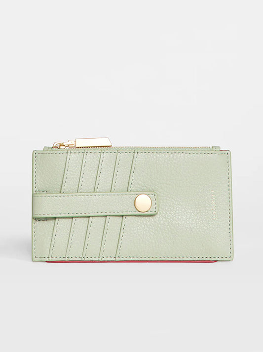A Hammitt Los Angeles 210 West Wallet in Cypress Sage with a diagonal pattern, featuring a gold zipper and a circular clasp on the front.