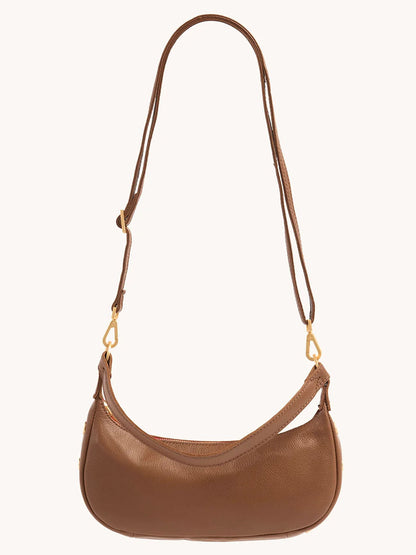 Hammitt Los Angeles Becker Small in Mahogany Pebble is a brown leather crossbody bag featuring a long adjustable strap and brushed gold hardware.